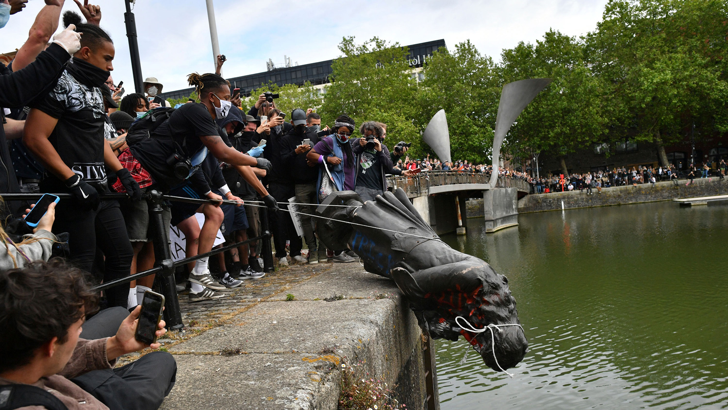 The protesters threw a statue of a slave trader Edward Coulston in Bristol Harbor, during a protest march for a black life in Bristol, England, on June 7.